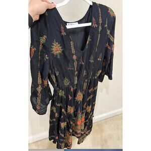 Large patterned dress, past knees